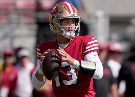 Daniels runs past the Cleveland Browns defense on Sunday.