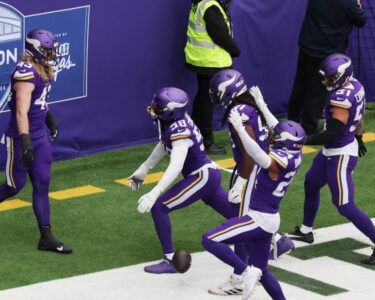 Oct 6, 2024; London, United Kingdom; Minnesota Vikings fans pose with mascot VIktor and cheerleaders before the NFL London Game at Tottenham Hotspur Stadium. Mandatory Credit: Kirby Lee-Imagn Images