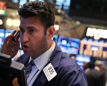 Stock market today: Indexes end mixed as traders assess rate path and brace for more earnings