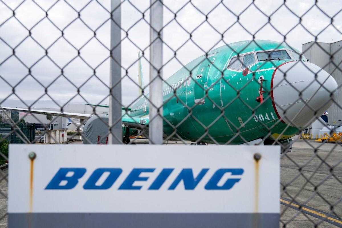 Striking Boeing workers make earnings day a cliffhanger for CEO