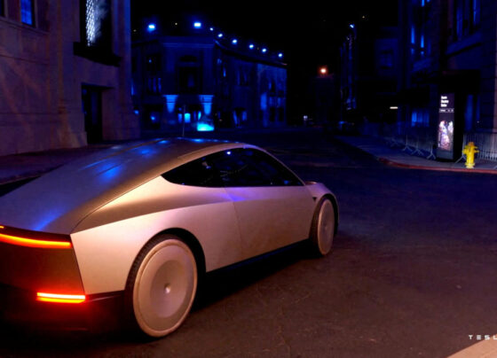 Tesla CEO and X owner Elon Musk rides in Tesla's robotaxi at an unveilling event in Los Angeles, California, U.S. October 10, 2024 in this still image taken from video. Tesla/Handout via REUTERS