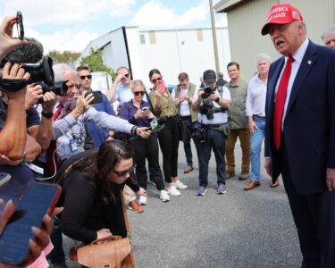 Trump visits Georgia hurricane site, bashes Harris