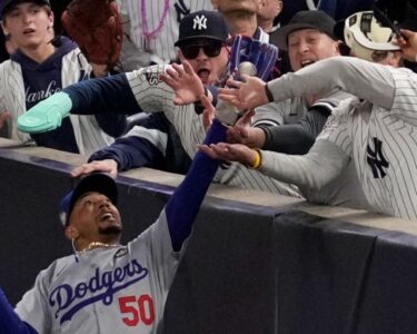 Yankees fans ejected after ripping ball from Mookie Betts’ glove during Game 4 of World Series | CNN