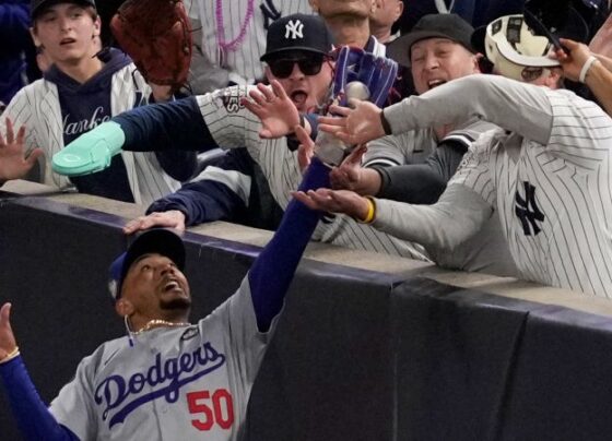 Yankees fans ejected after ripping ball from Mookie Betts’ glove during Game 4 of World Series | CNN