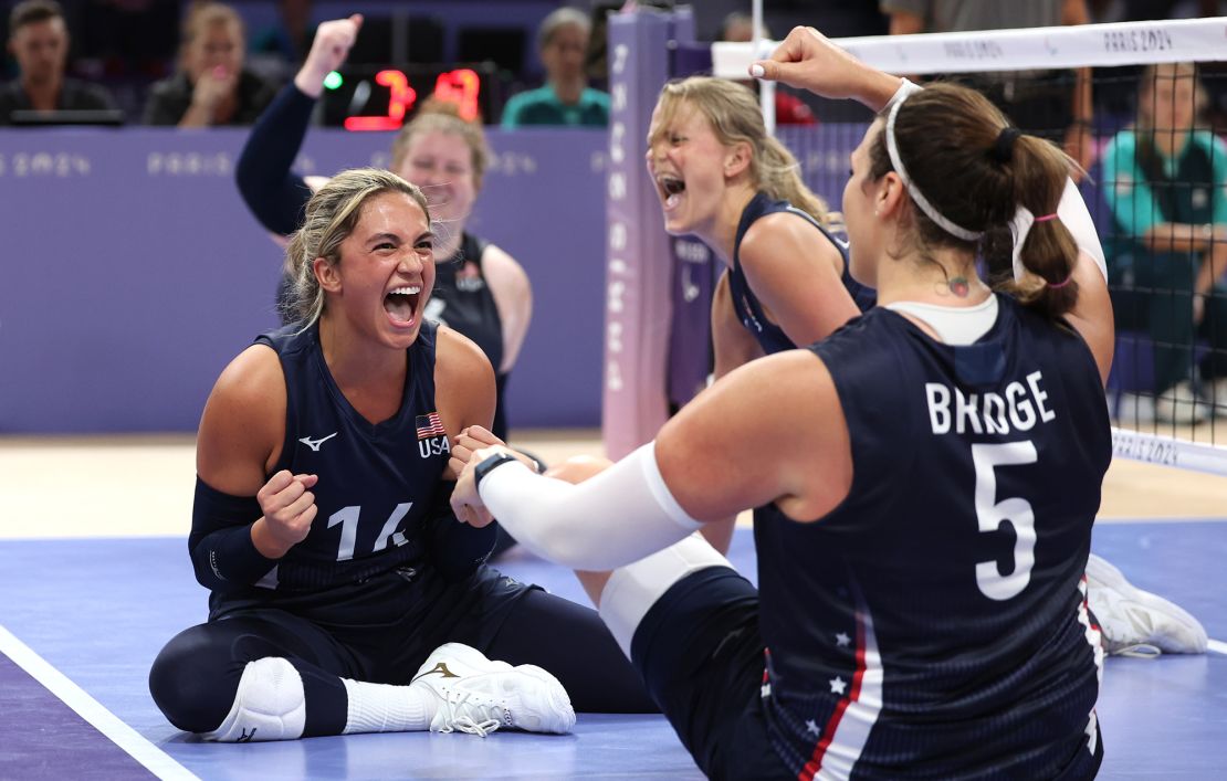 Team USA celebrates against China during the women's sitting volleyball competition.