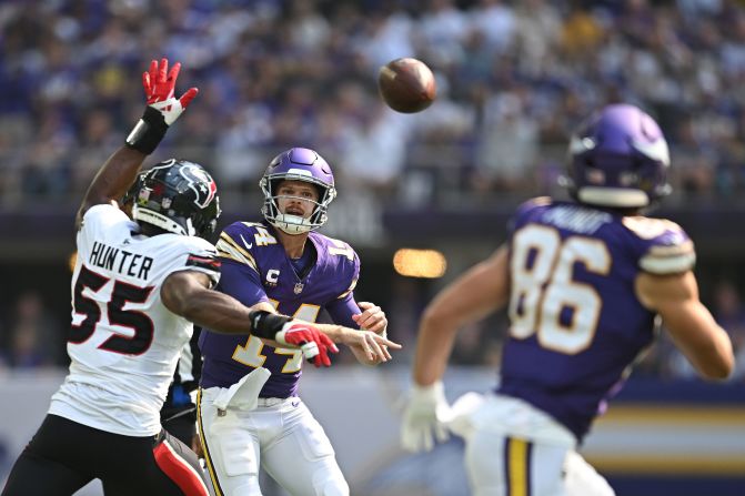 Minnesota Vikings quarterback Sam Darnold throws the ball to tight end Johnny Mundt in Minneapolis on Sunday, September 22. The Vikings beat the Houston Texans 34-7.