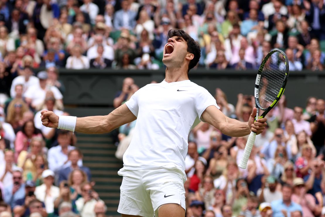 Alcaraz celebrates winning his fourth grand slam title at Wimbledon earlier this year.