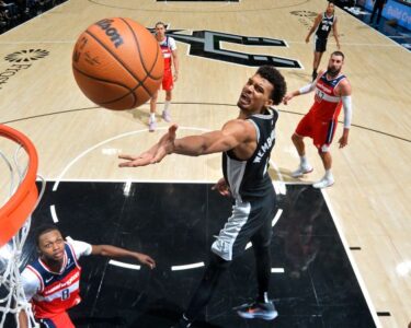 Milwaukee Bucks forward Giannis Antetokounmpo shoots over Detroit Pistons forward Isaiah Stewart during the first quarter at Fiserv Forum.