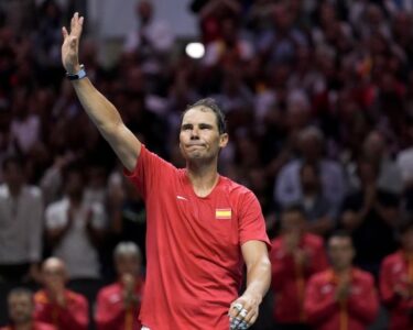 Nadal and Carlos Alcaraz of Spain line up for the national anthems ahead of Tuesday's Davis Cup quarterfinal.