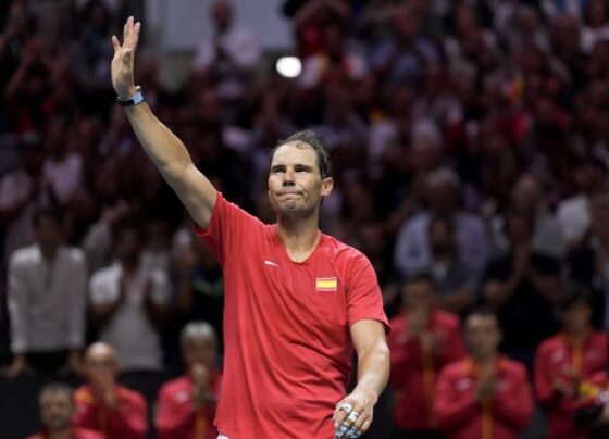 Nadal and Carlos Alcaraz of Spain line up for the national anthems ahead of Tuesday's Davis Cup quarterfinal.