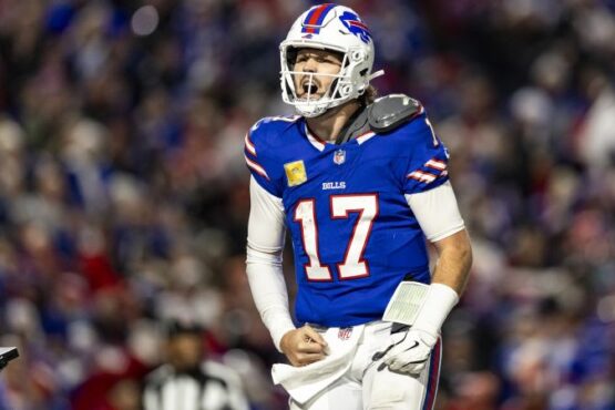 Buffalo Bills quarterback Josh Allen slips past Kansas City Chiefs cornerback Nazeeh Johnson to score on a 26-yard run near the end of the game in Orchard Park, New York, on Sunday, November 17. The Bills beat the Chiefs 30-21, ending Kansas City’s 15-game win streak. Allen finished with 262 yards, one touchdown and one interception while adding 57 yards and a score on the ground.