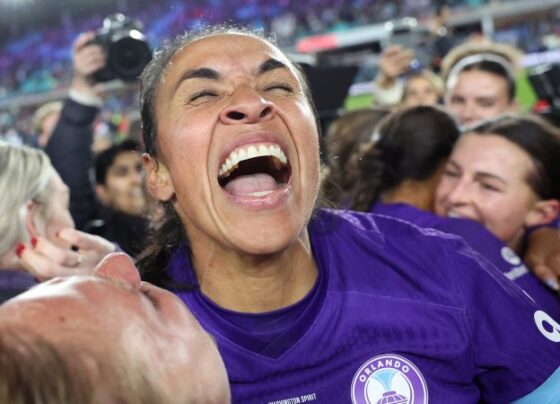 Marta, who many considered the greatest woman footballer of all time, celebrates the title win with her Pride teammates.