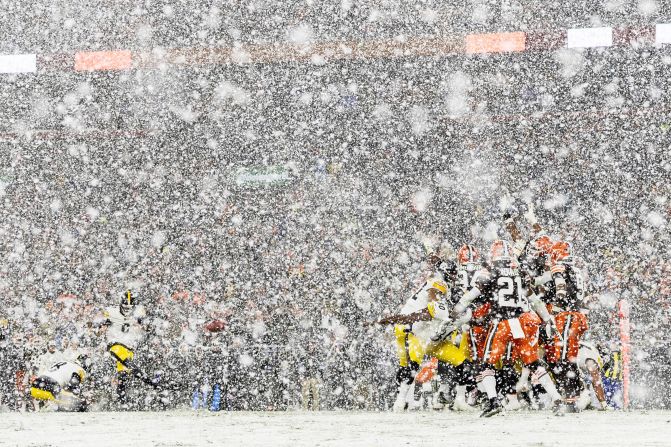 Pittsburgh Steelers kicker Chris Boswell kicks a field goal through the snow in Cleveland on Thursday, November 21.