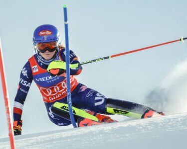 Shiffrin celebrates on the podium after winning the women's slalom race on November 23.