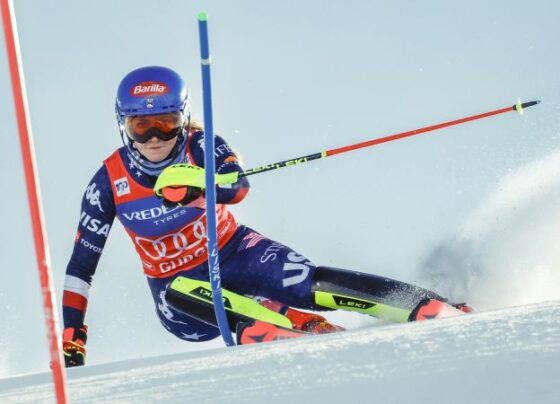 Shiffrin celebrates on the podium after winning the women's slalom race on November 23.