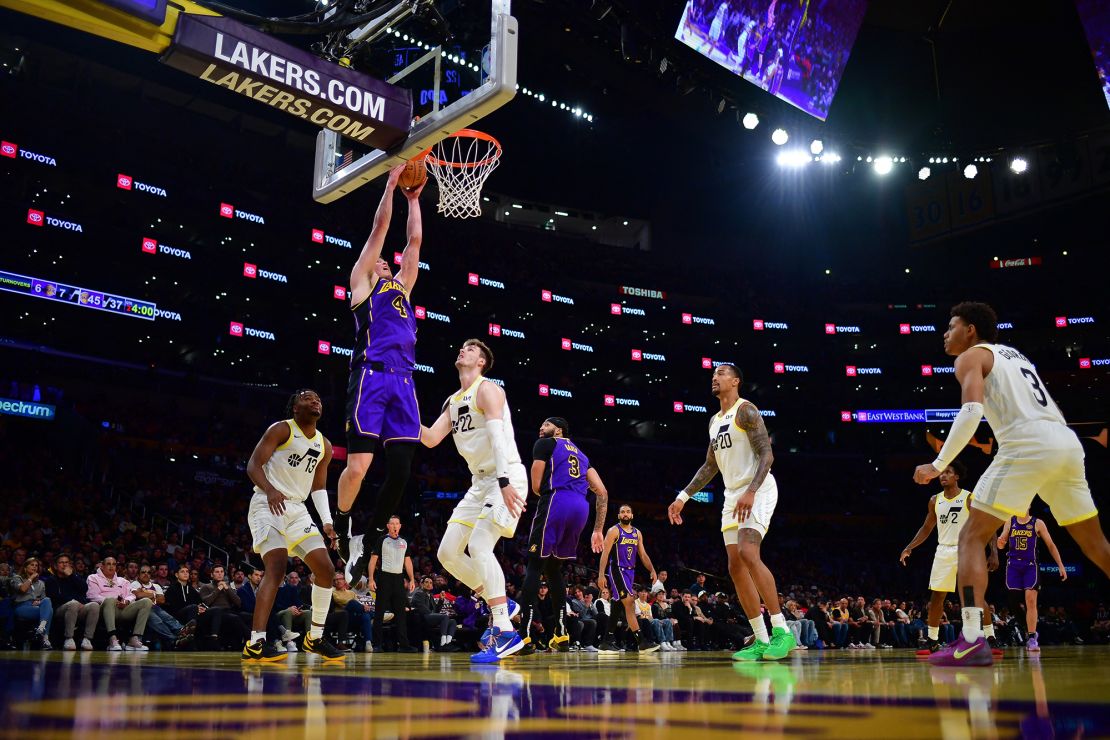 Los Angeles Lakers guard Dalton Knecht (4) moves in to score against the Utah Jazz.