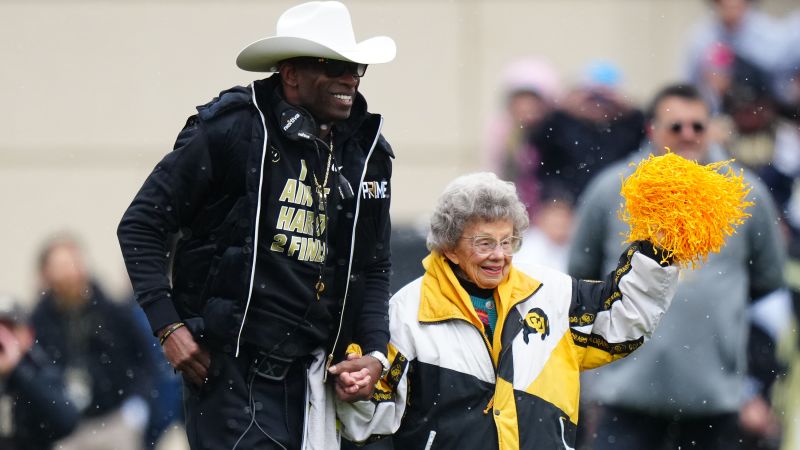 Deion Sanders honors 100-year-old Colorado Buffaloes superfan with ‘Peggy’ apparel line | CNN