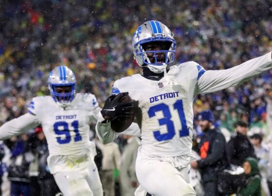 St. Brown (No. 14) scored a touchdown on the opening drive of the game for the Lions.