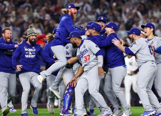 The Los Angeles Dodgers' Freddie Freeman celebrates his two-run home run against the New York Yankees during the first inning in Game 4.