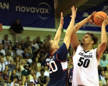 Colorado players celebrate their win at the Maui Invitational.