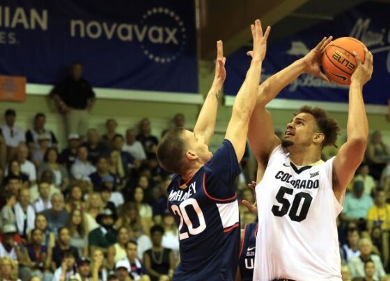 Colorado players celebrate their win at the Maui Invitational.