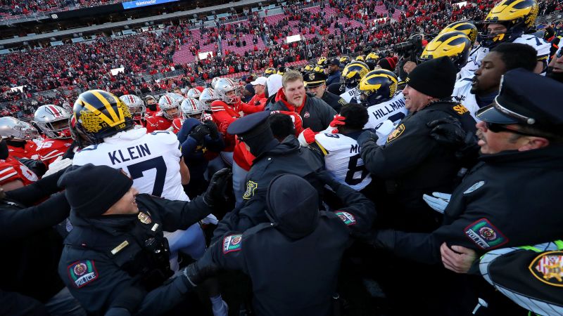 Brawl ensues after Michigan deals stunning upset loss to rival Ohio State | CNN