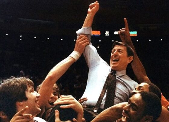 St. John's coach Lou Carnesecca is carried by his team after they beat Boston College in the Big East Championship at Madison Square Garden, in New York, on March 12, 1983.