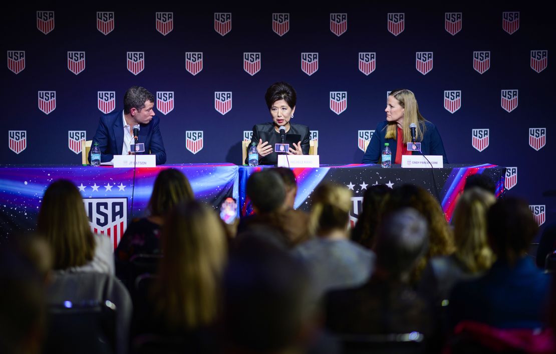 Michele Kang speaks alongside JT Batson and Cindy Parlow Cone during a US Soccer press conference on November 19.