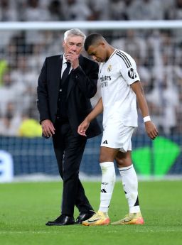 Carlo Ancelotti speaks to Mbappe at the end of a match on September 21 in Madrid.