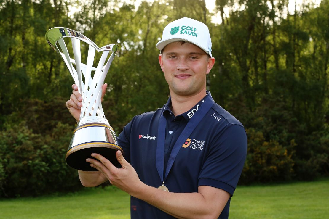 Popert toasts victory at the 2024 G4D, staged at Woburn Golf Club in Woburn, England, in May.