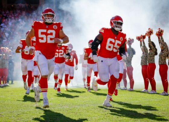 KANSAS CITY, MISSOURI - DECEMBER 08: Matthew Wright #49 of the Kansas City Chiefs celebrates the game winning field goal with Matt Araiza #14 during the fourth quarter fala at GEHA Field at Arrowhead Stadium on December 08, 2024 in Kansas City, Missouri. (Photo by Jamie Squire/Getty Images)