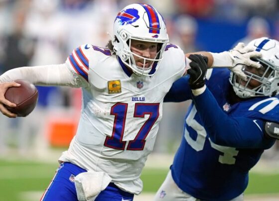 Allen passes the ball against the Colts on November 10 in Indianapolis.