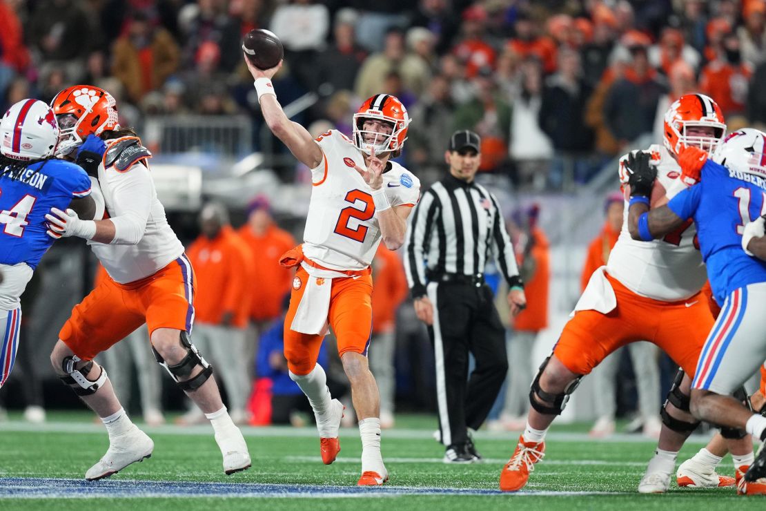 Cade Klubnik of the Clemson Tigers throws a pass for a touchdown during the first quarter of the 2024 ACC Football Championship at Bank of America Stadium on December 7, in Charlotte, North Carolina.