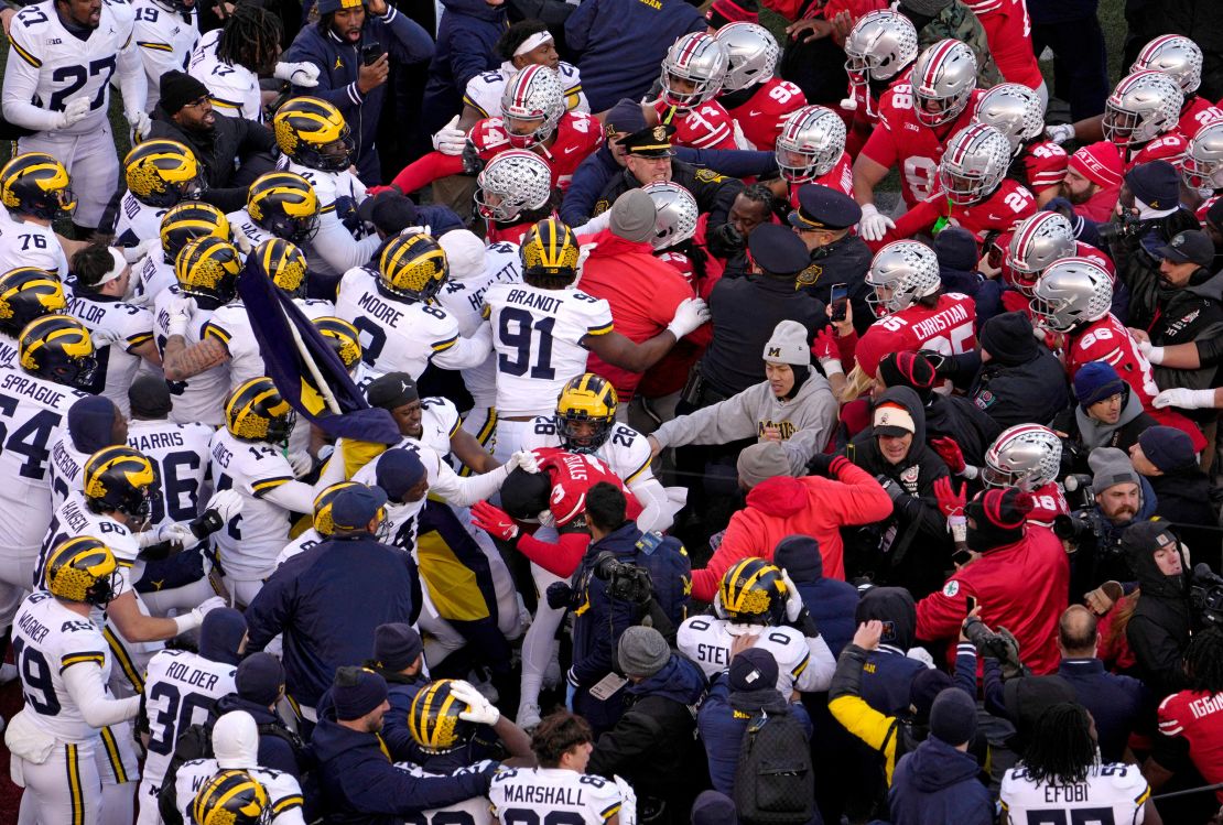 Michigan and Ohio State fight following the 13-10 Wolverines win over the Buckeyes on November 30.