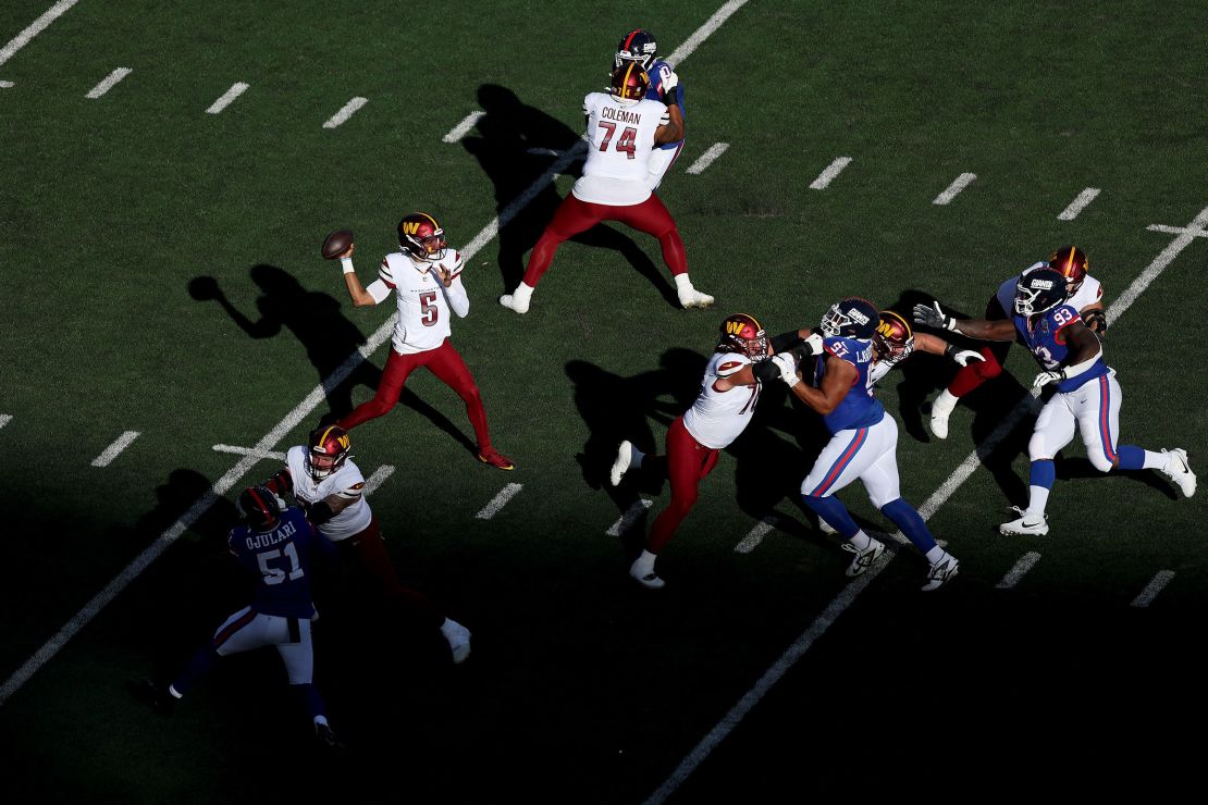 Jayden Daniels looks to pass against the New York Giants in East Rutherford, New Jersey, on November 3.