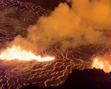 In this aerial photo provided by the U.S. Geological Survey, an eruption takes place on the summit of the Kilauea volcano in Hawaii, Monday, Dec. 23, 2024.