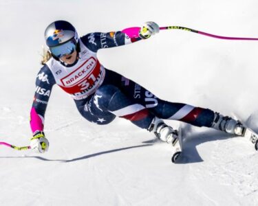 Lindsey Vonn takes a selfie in the finish area after completing an alpine ski, women's World Cup super G, in St. Moritz, Switzerland, on December 21, 2024.