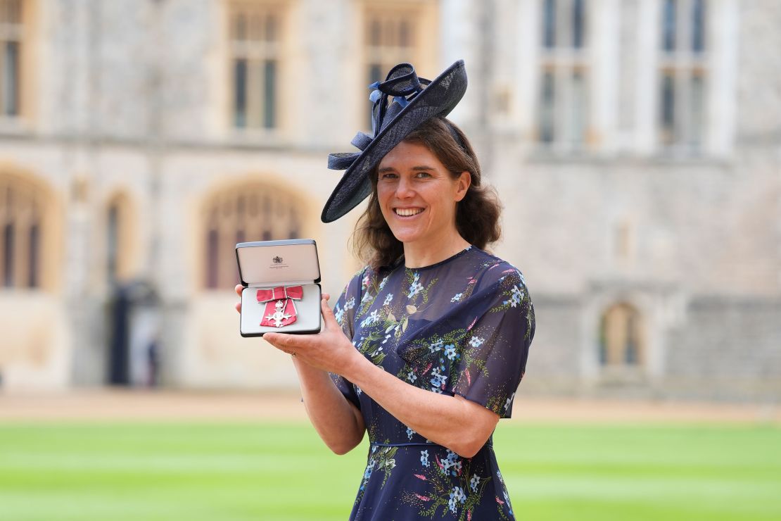 Paris poses for photos after being made a MBE (Member of the Order of the British Empire) during an investiture ceremony at Windsor Castle on October 16.