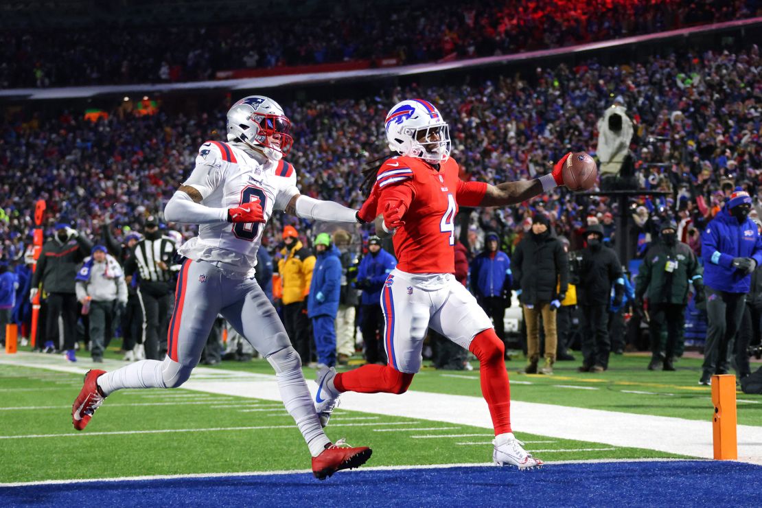 Cook rushes for a touchdown against the New England Patriots on December 22.