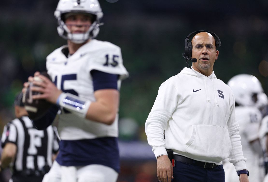 Penn State head coach James Franklin watches Nittany Lions quarterback Drew Allar (No. 15) throw at the 2024 Big Ten Championship game at Lucas Oil Stadium.