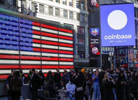 Crypto-linked stocks jump as bitcoin tops key $100,000 threshold for the first time ever