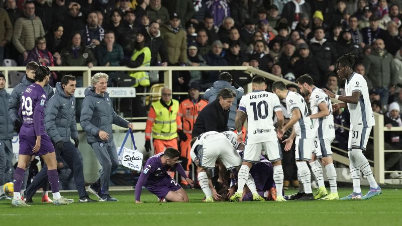 Serie A match abandoned after Fiorentina player collapses on field | CNN