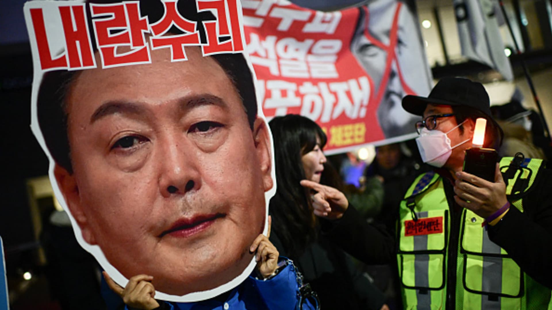 South Korea’s acting president moves to calm markets after Yoon impeachment