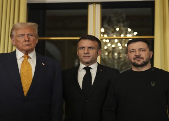 Trump is welcomed by Macron to Paris with presidential pomp and joined by Zelenskyy in their meeting