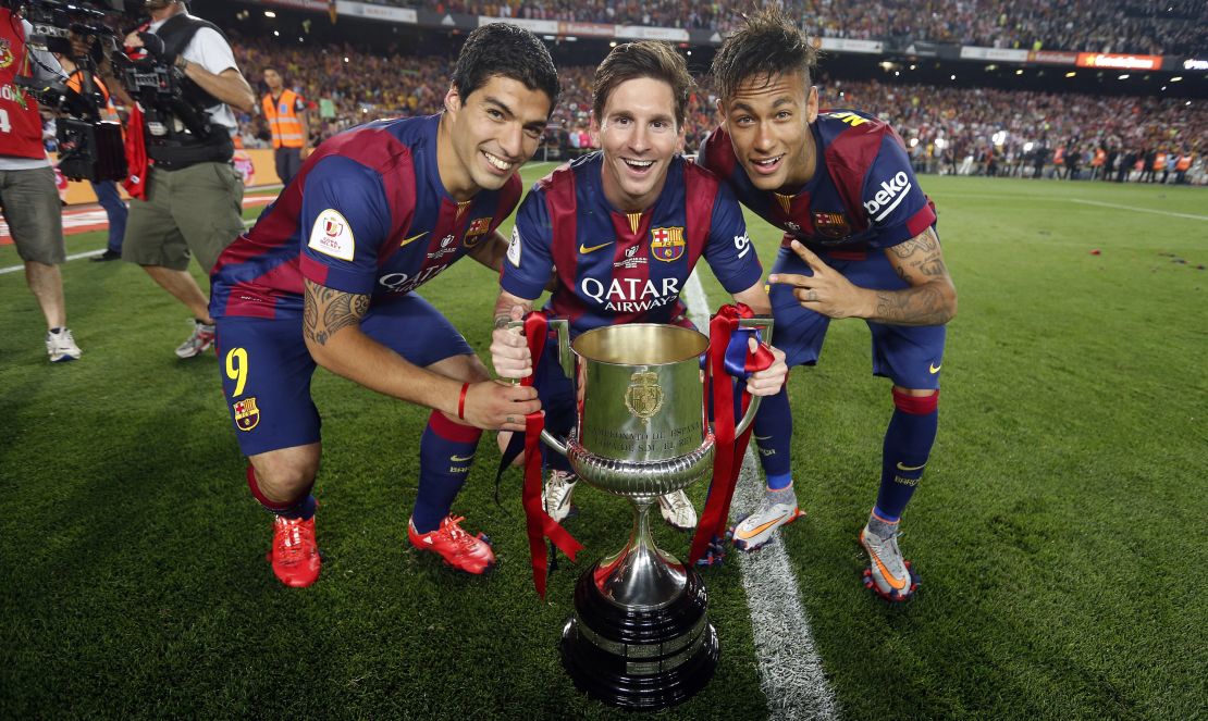 BARCELONA, SPAIN - MAY 30: Luis Suarez, Lionel Messi and Neymar of FC Barcelona pose with the Copa del Rey trophy after winning the Copa del Rey Final between Athletic Club and FC Barcelona at Camp Nou on May 30, 2015 in Barcelona, Spain. (Photo by Miguel Ruiz/FC Barcelona via Getty Images)