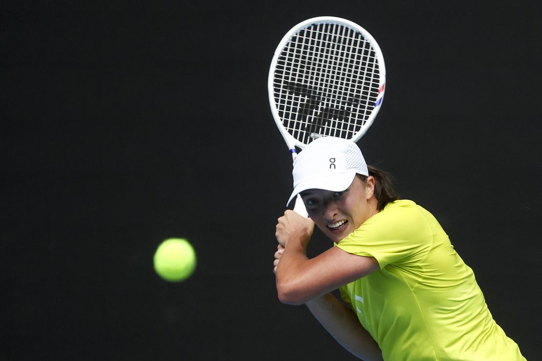 Poland's Iga Swiatek hits a return during a training session ahead of the Australian Open tennis tournament in Melbourne on January 9, 2025. (Photo by DAVID GRAY / AFP) / -- IMAGE RESTRICTED TO EDITORIAL USE - STRICTLY NO COMMERCIAL USE -- (Photo by DAVID GRAY/AFP via Getty Images)