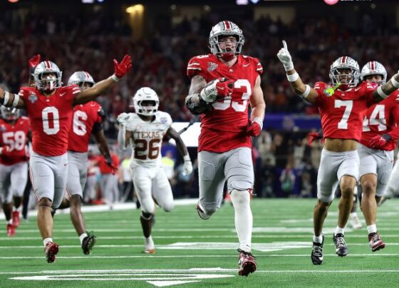 Ohio State head coach Ryan Day and quarterback Will Howard celebrate after the Cotton Bowl College Football Playoff.