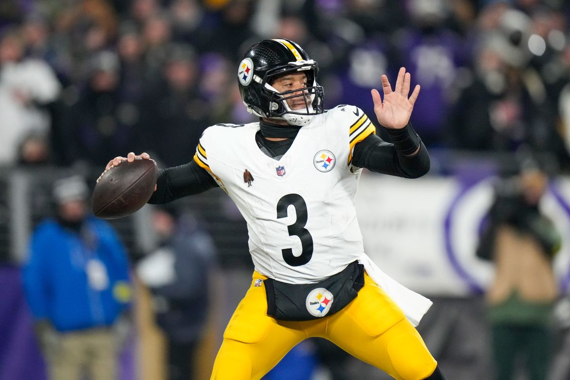 Pittsburgh Steelers quarterback Russell Wilson throws a pass against the Baltimore Ravens during the second half of an NFL wild-card playoff football game.