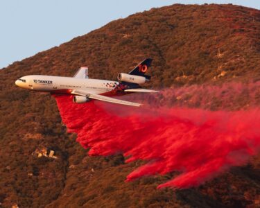 A huge village has sprung up on the golden sands of a Malibu beach, temporary home to thousands of firefighters from all over North America, where the brave men and women battling Los Angeles' fires eat, sleep and recuperate.