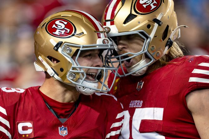 San Francisco 49ers quarterback Brock Purdy celebrates with tight end George Kittle after scoring a touchdown in the 49ers' 40-34 loss to the Detroit Lions in Santa Clara, California, on Monday, December 30.